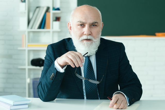 Senior professor serious. School teacher or college and university lecture. Back to school