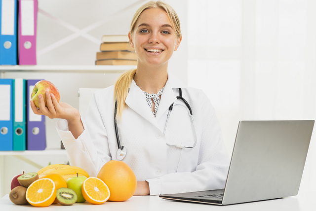 medium shot smiley nutritionist with apple